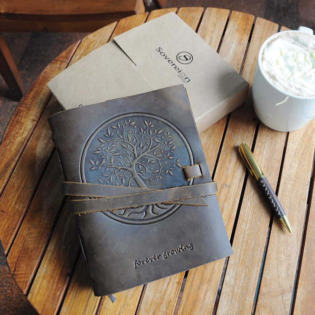 Tree of Life Leather Embossed Journal and Bookmark on Desk with Pen
